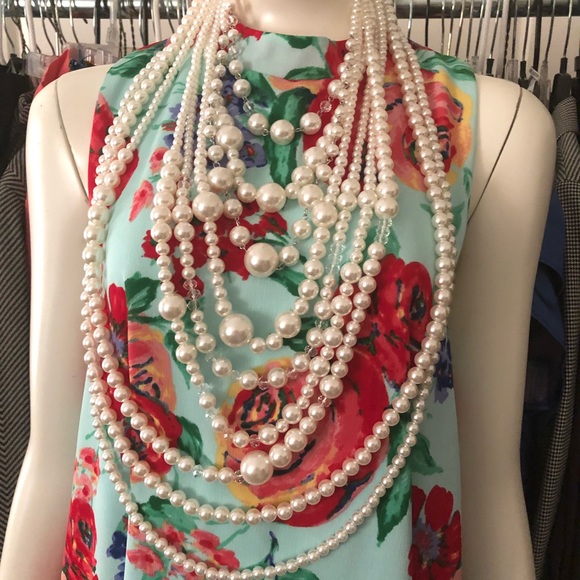 Vivian’s Closet Jewelry - Beautiful Pearls of course! 9 strands of fab!